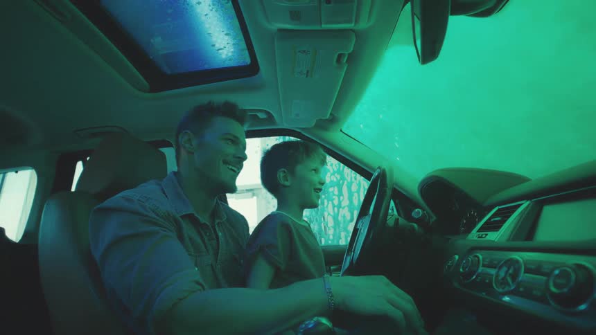 A clip of a father and son in the car