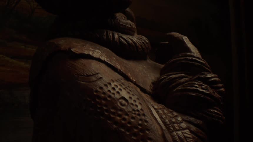 A mummified body carved in wood