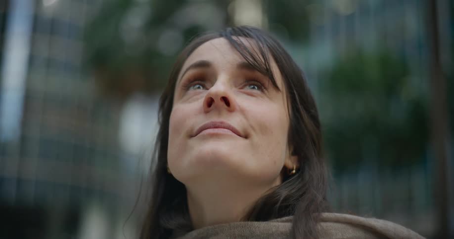 A close up clip of a lady looking around
