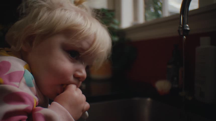 A clip of a kid playing with toothpaste