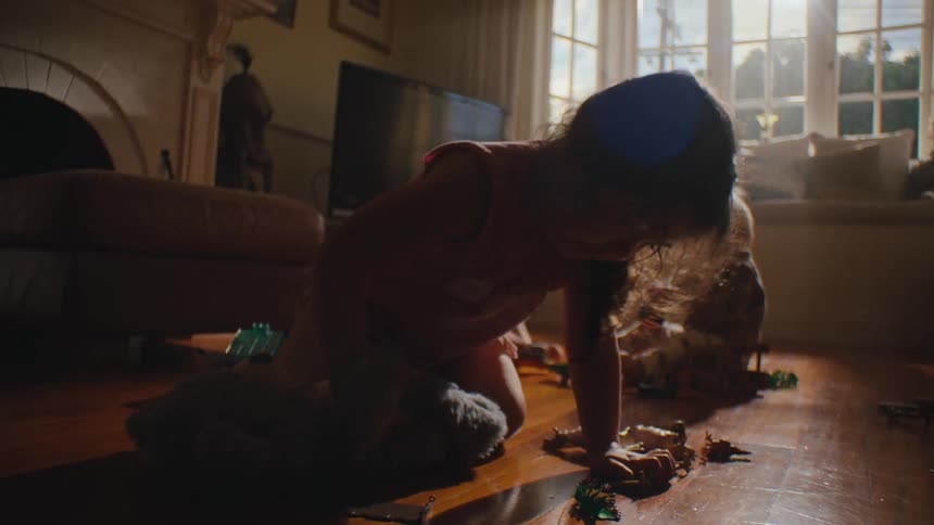 Children play with toys in the living room