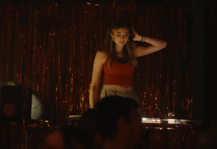 Female DJ playing at a party