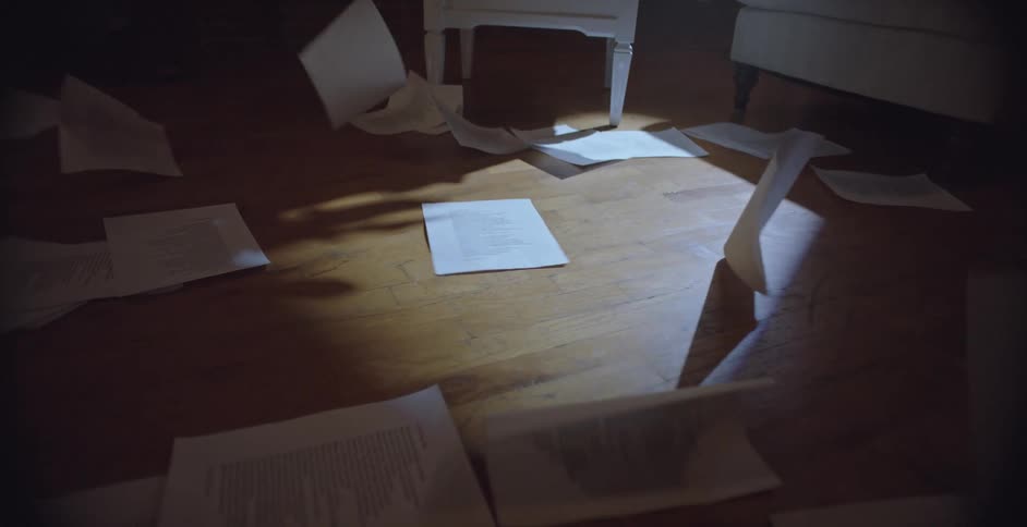 A clip of falling documents