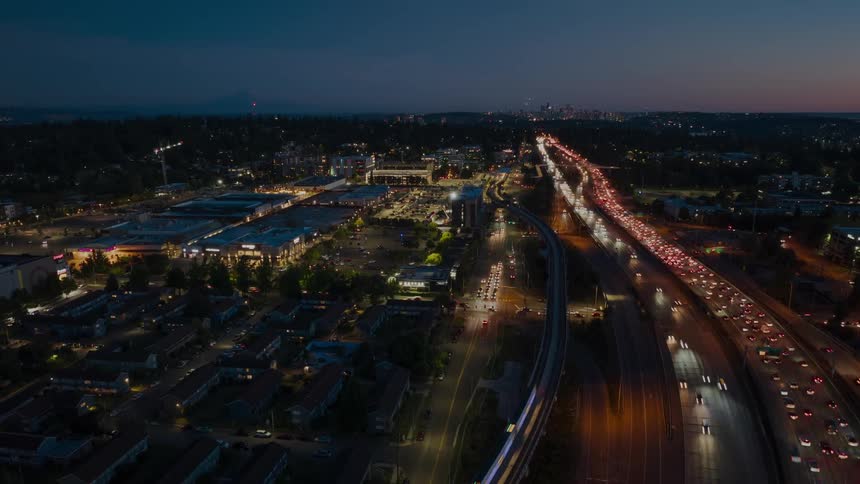 Heavy traffic crawls towards Seattle along the I-5 corridor past the Northgate neighborhood