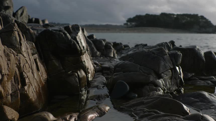 Rocks by the sea on a cloudy day