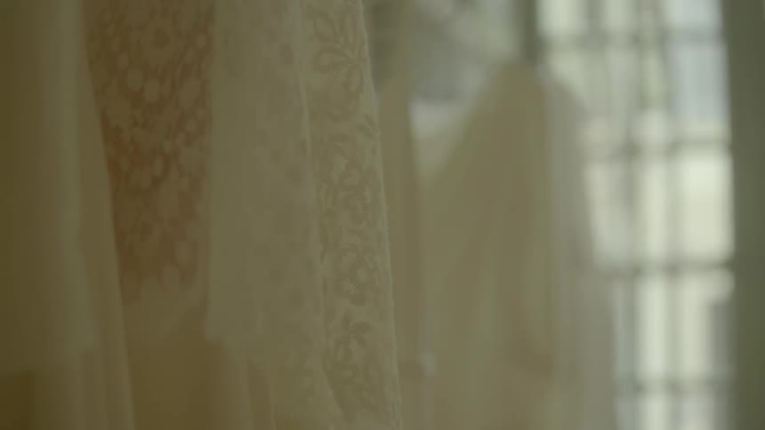 Close up on white dresses