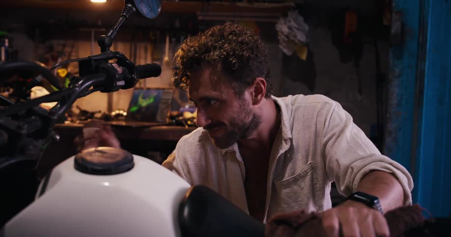 Mechanic man working on a motorcycle