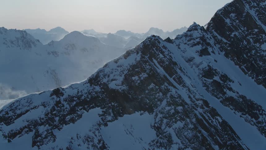Mountain cliff covered in snow