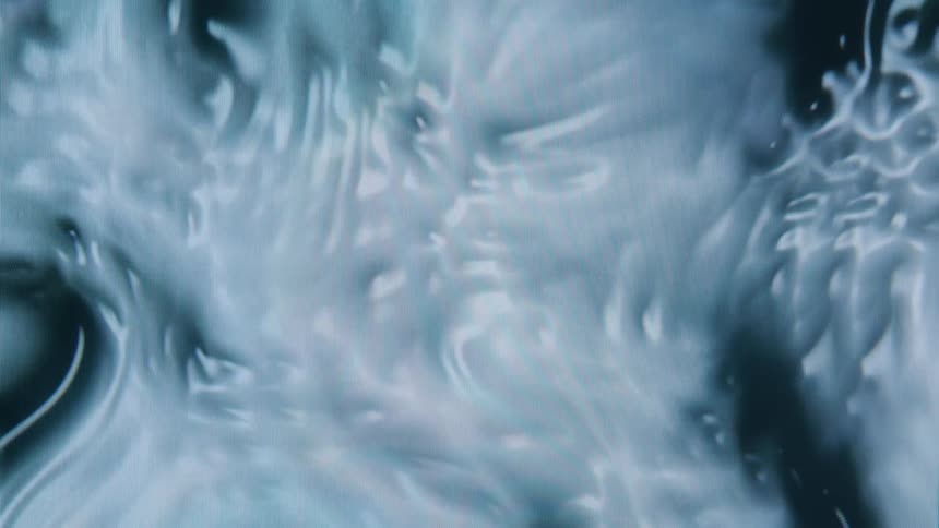 Whitish dense liquid in motion