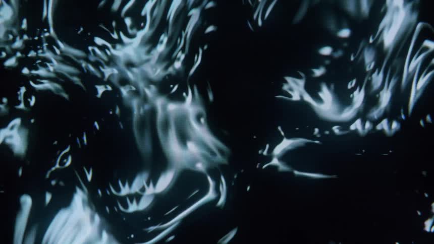 Metallic mixture morphs through various patterns against a black background