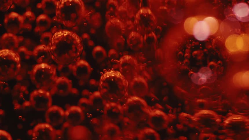Red carbonated liquid with bubbles