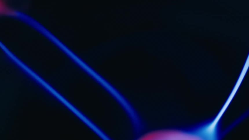 A closeup of a plasma ball with electric arcs reaching out from the central sphere