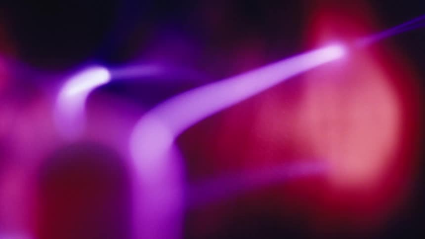 Close up of purple rays inside a plasma ball