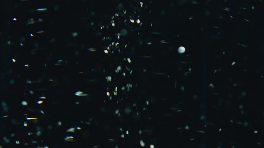 Transparent liquid in rotating motion with abstract glow