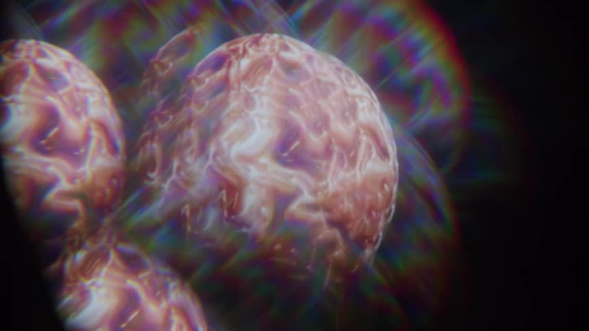 Abstract sphere and liquid moving against a black background