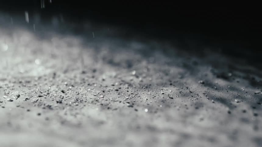 Sand with jumping boulders