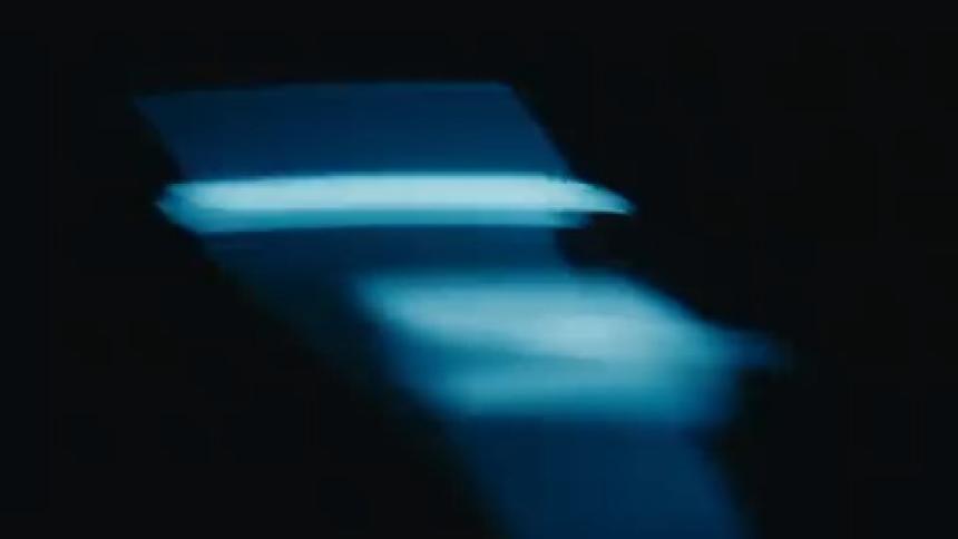Flashing spots of light pass by quickly