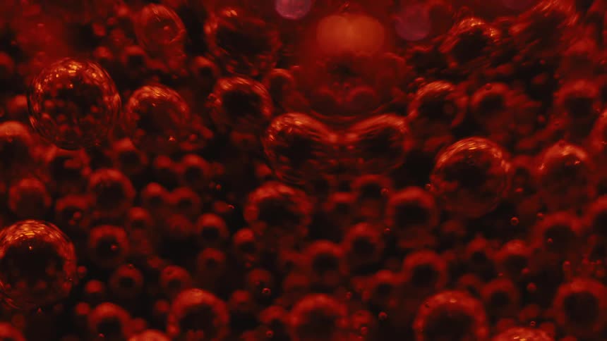 Red carbonated liquid with bubbles