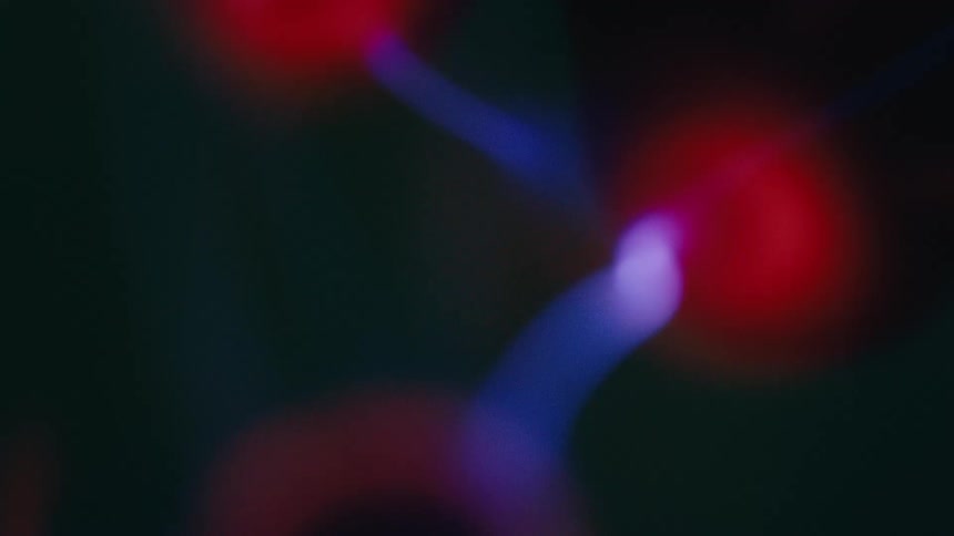 Abstract blue and red neon light against dark background