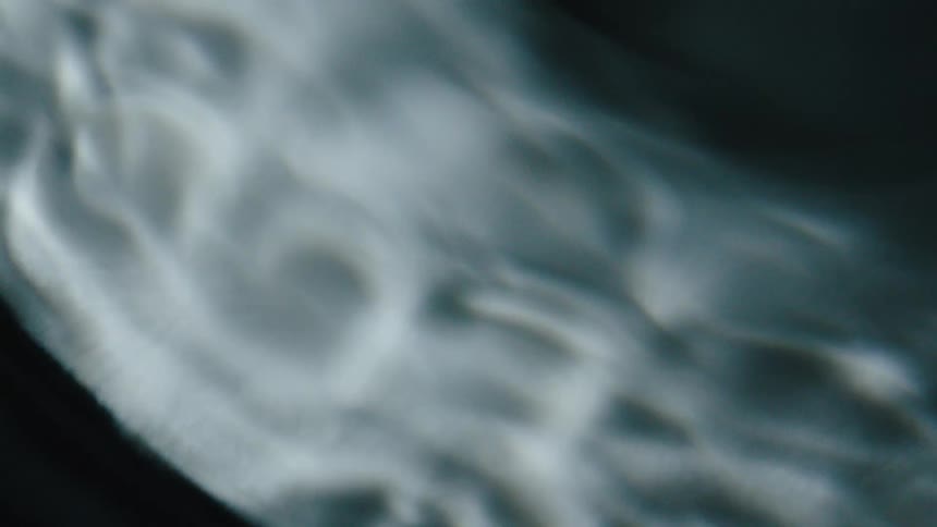 White abstract texture in circular motion