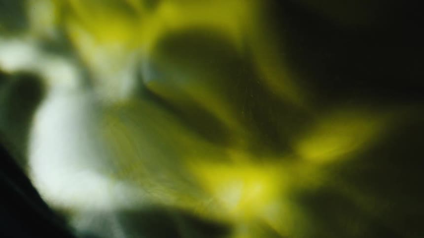 White and yellow texture in abstract rotating motion