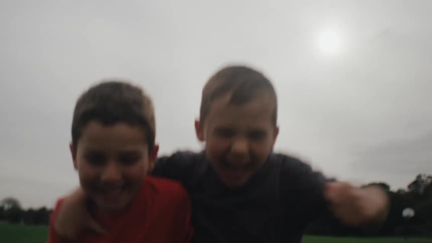A clip of happy kids having fun and hugging
