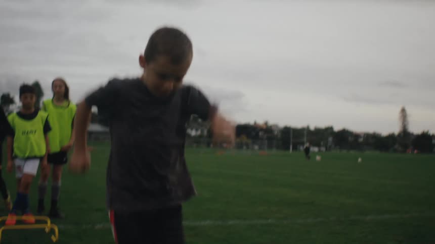 A clip of kids training on the field