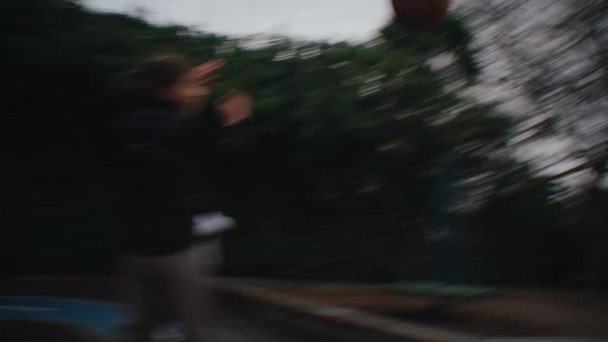 A clip of children playing basketball