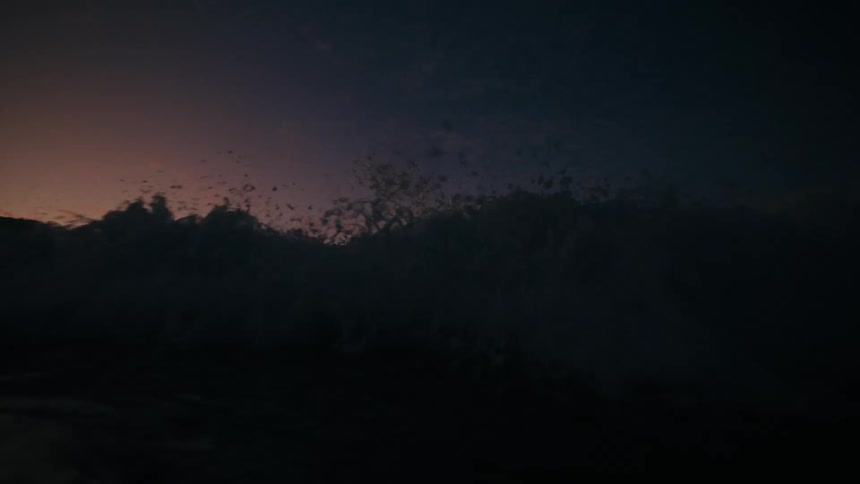 Dark ocean horizon under a twilight sky