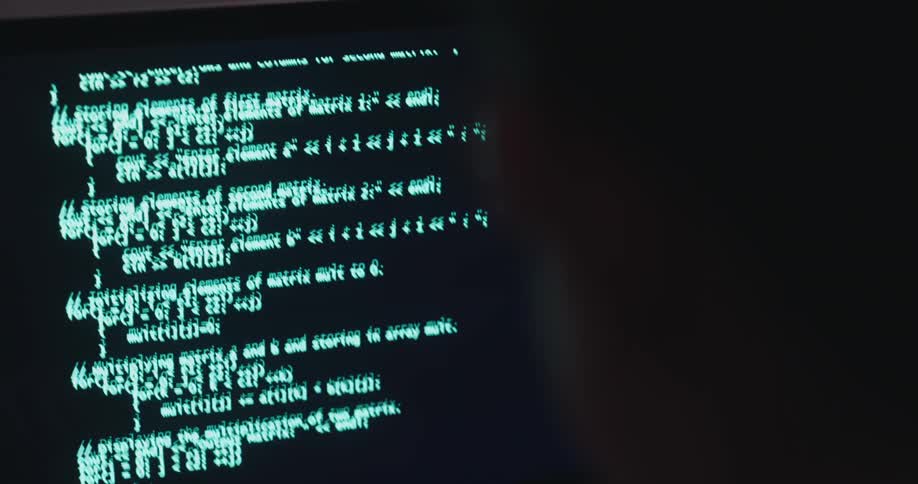 Person looking intently at a code on the screen