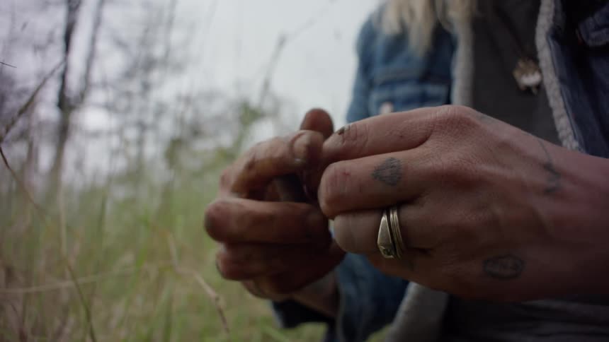Close up of a womans hands with clay