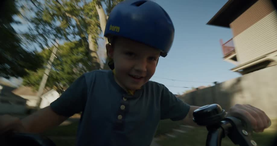 Point of view of a little boy riding a bike