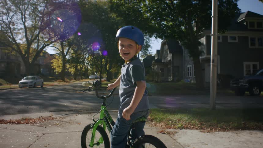 Little boy on bike having fun