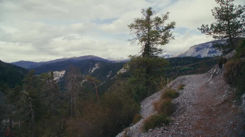A trail runs up the mountain side