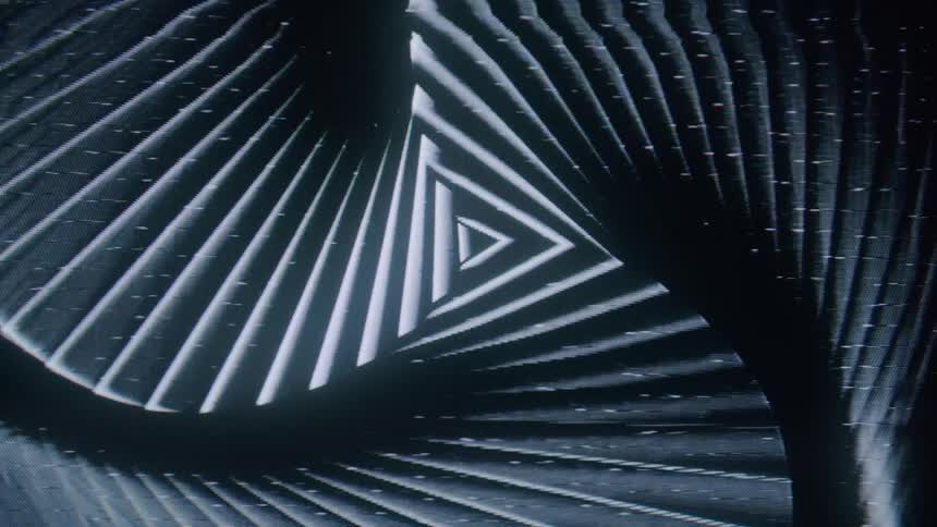 A spinning pattern of overlapping triangles creating a sense of depth and perspective