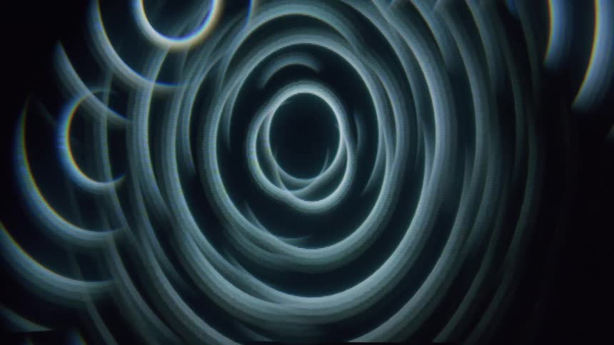A series of concentric circles with a textured appearance radiating outwards