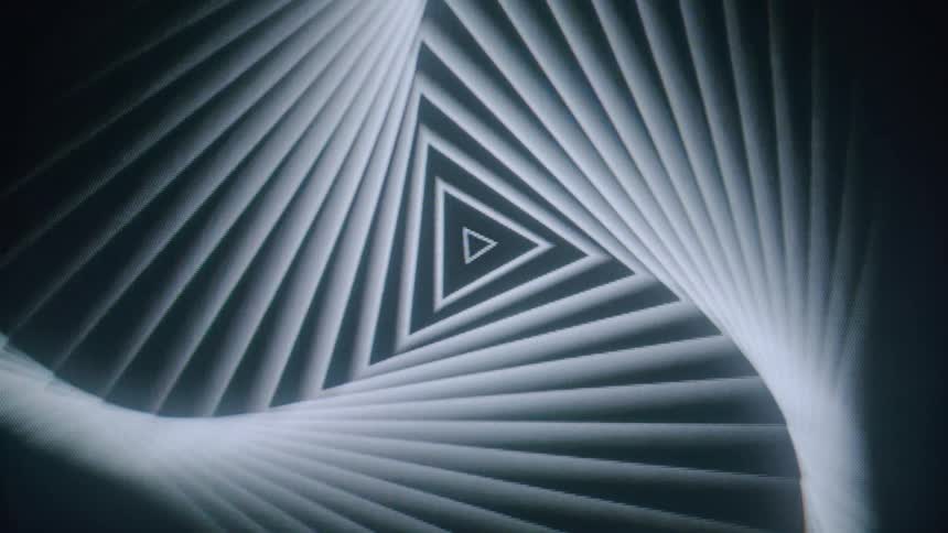 An expanding pattern of overlapping triangles creating a sense of depth and perspective