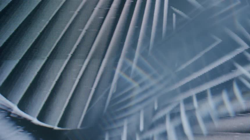 Abstract triangle patterns against a black background