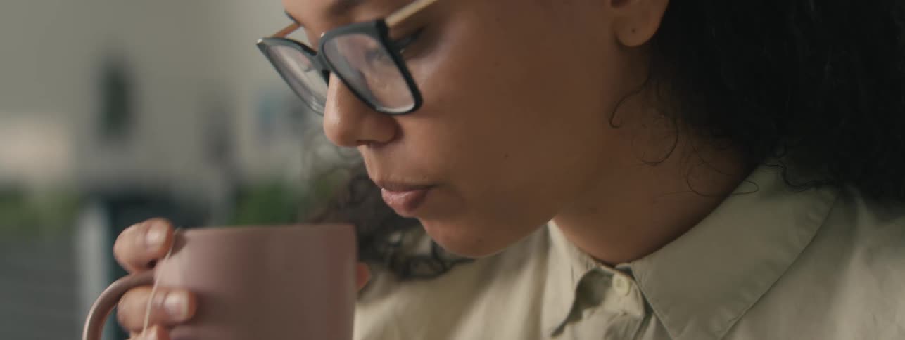 Woman drinking from a mug