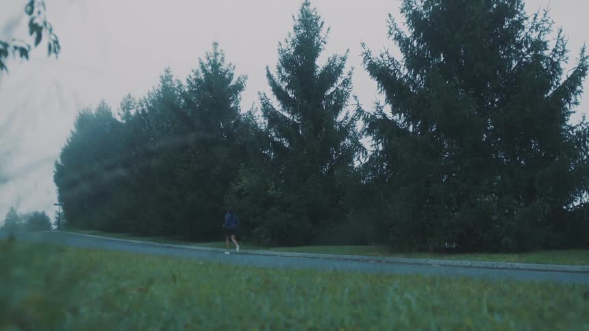 A woman jogs on the trail