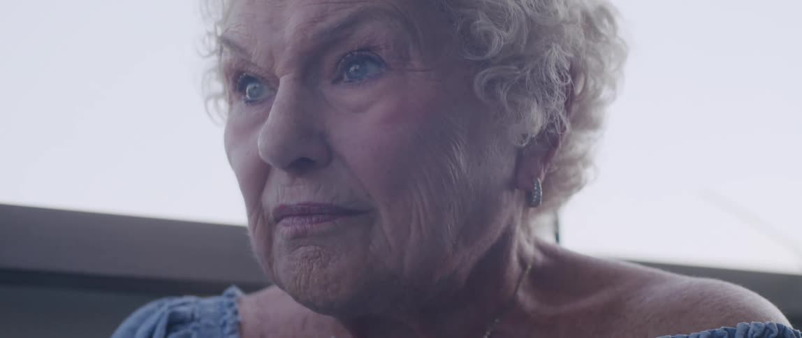 Portrait of an elderly blueeyed woman in an outdoor setting