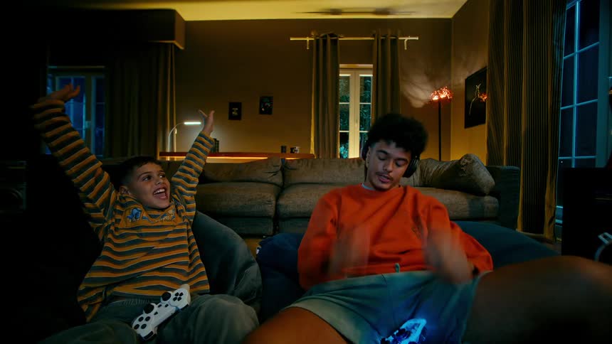 A clip of brothers playing a console game