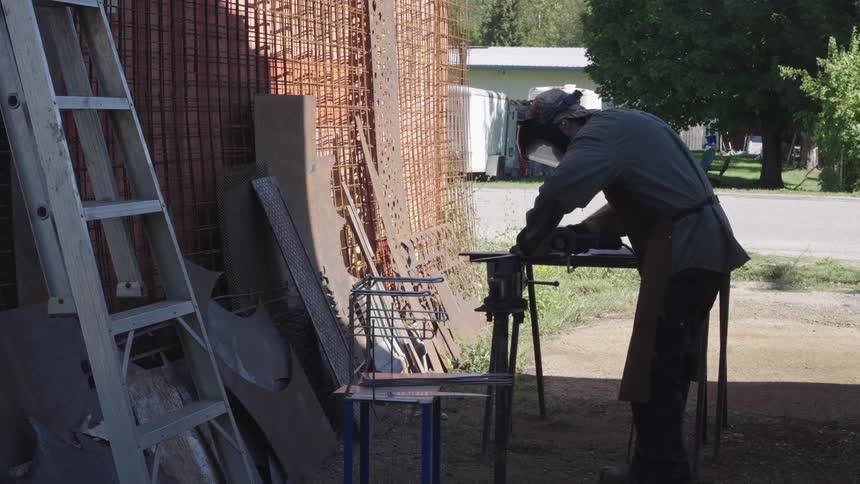 A construction worker is working outside
