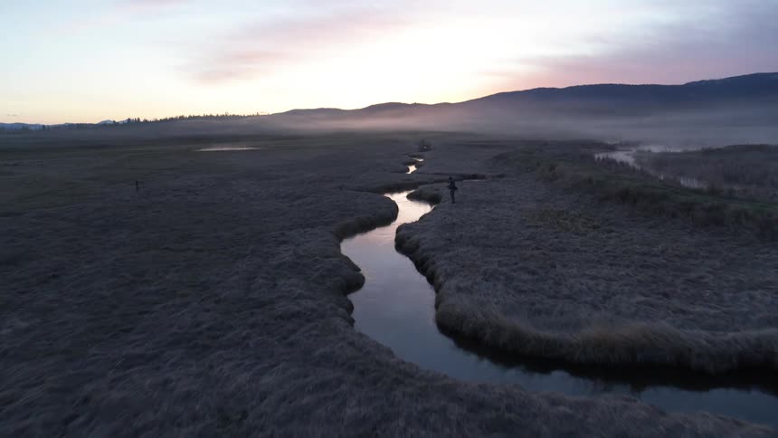 A river winds through the land