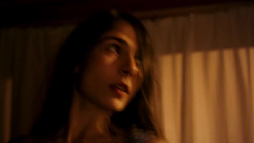 Portrait of a young woman dancing