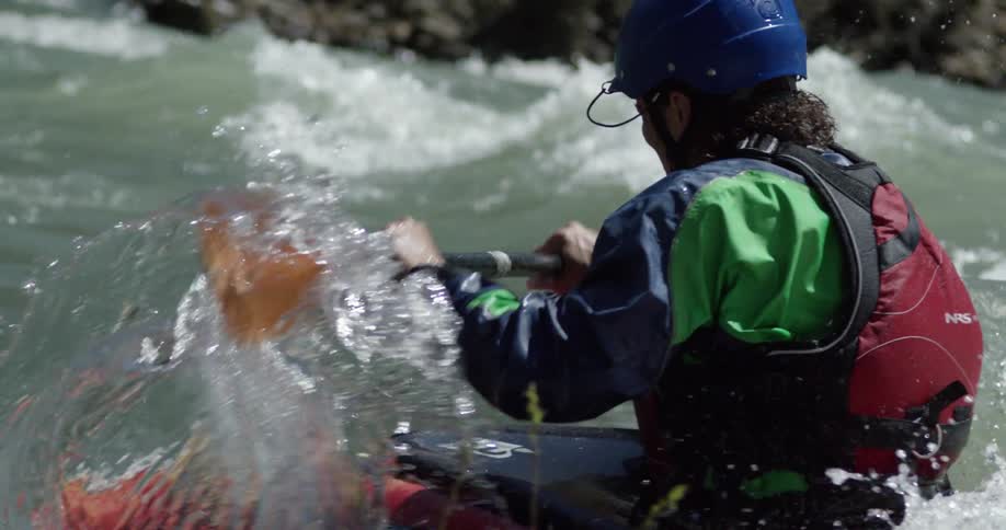 Kayaker maneuvering through some rough waters