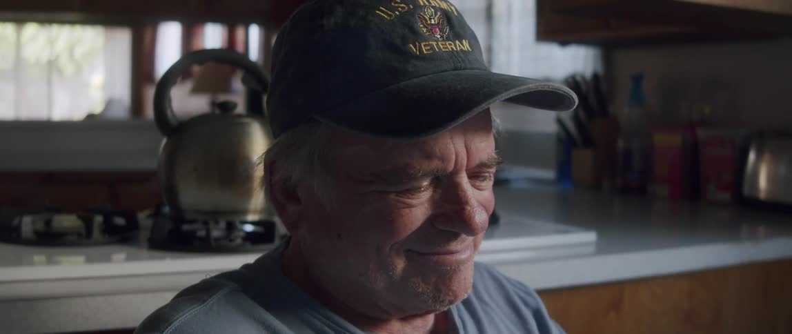 Portrait of a happy emotional elderly man