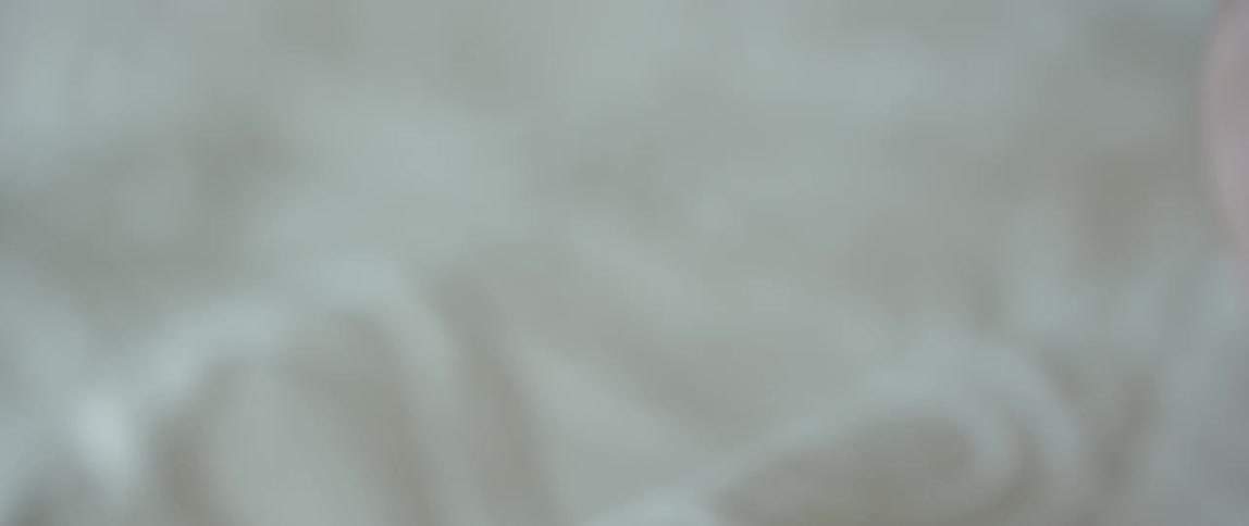 Close up of a babies hand and arm
