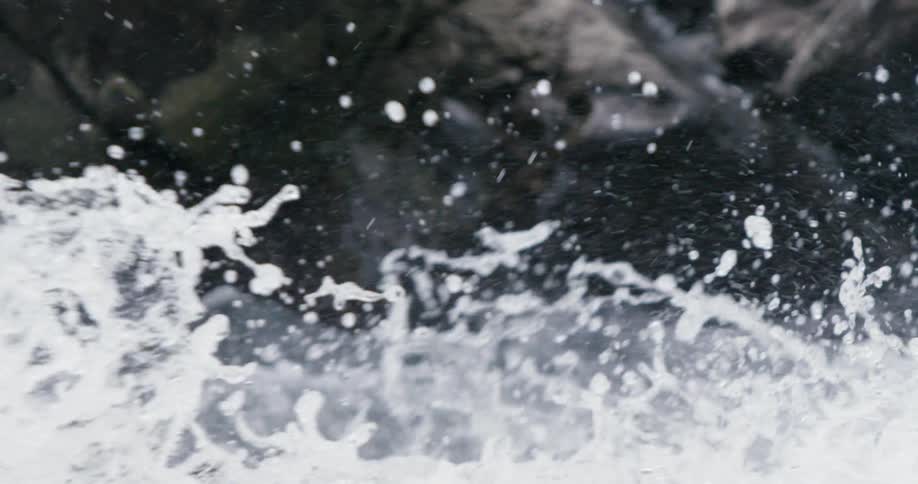 River water splashes over rapids