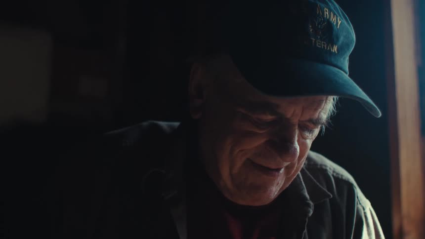 A clip of an elderly man working